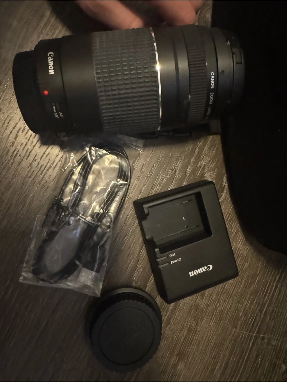 Canon Rebel T6 Camera with Black Body and Red-Trim Strap